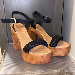 Black heels with braided strap. Never worn before
